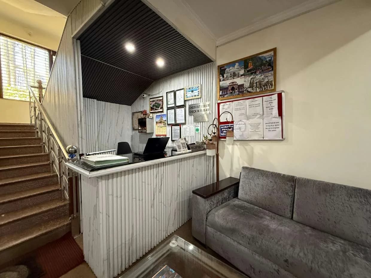 Reception desk with staircase and lobby sofa